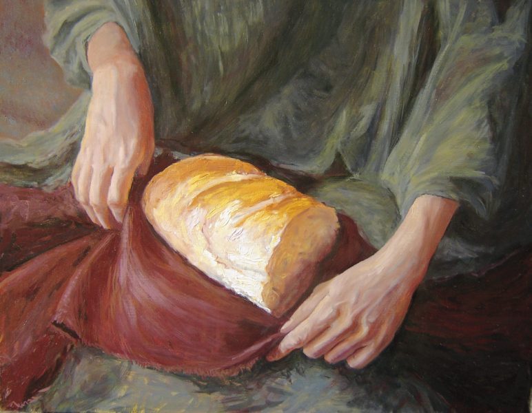 Hands holding a bread. Oil painting.